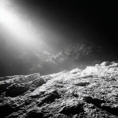 Aufkleber - Ethereal Light on Lunar Surface: A stark black and white view of a rocky landscape with radiant light piercing the darkness.
