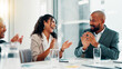 © peopleimages.com - Business people, applause and success at office with meeting, profit and goals at finance agency. Man, women and excited with cheers, celebration and achievement with revenue growth at company