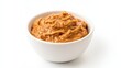 © Open - Creamy, light-brown spread in a white bowl