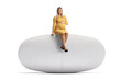 © Ljupco Smokovski - Pregnant woman sitting on a big pill