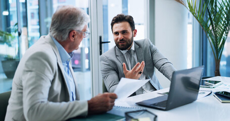 Fototapete - Business men, strategy and team discussion in office, planning or brainstorming insurance stats with paper. Laptop, meeting and conversation with boss for report, risk management and explain idea