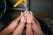 © banjongseal324 - Mother and child's hands helping the child wash their hands,Kid and adult are washing their hands. Protection against infections and viruses. Close up.