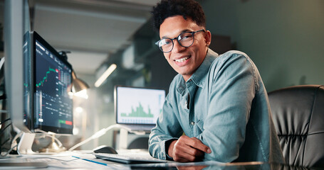 Poster - Man, trading and computer with portrait for charts, smile for review, typing or monitor for stocks at office. Person, happy and crypto investor at night by screen, value or market stats in Colombia