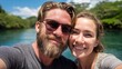 © Gabriel - A joyful couple enjoying a sunny day on a river, capturing a memorable selfie