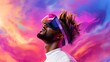 © Raul - Man wears a VR headset looking up against an abstract colorful backdrop featuring pink, purple, and blue hues.