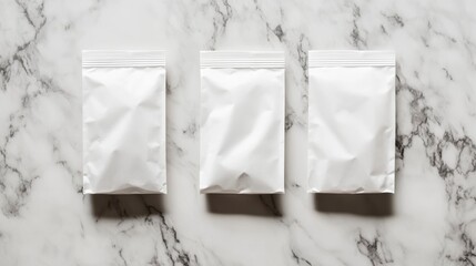Poster - Three blank white stand-up pouches on marble background.