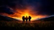 © Raul - Three hikers stand silhouetted on a grassy hill observing a vibrant sunset with cloudy skies.