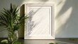 © Argiduna - Elegante maqueta de póster con marco blanco, sombras y plantas