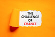 © Dzmitry - The challenge of chance symbol. Concept words phrase The challenge of chance on beautiful white paper. Beautiful orange paper background. Business The challenge of chance concept. Copy space.