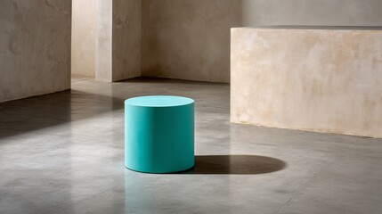 Aufkleber - A green cylindrical podium stands on a reflective floor, illuminated by soft overhead light while a neutral beige backdrop enhances the minimalist aesthetic and focus