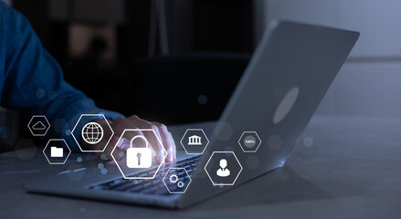 Wall Mural - Close up businessman hand typing or working on laptop for programming about cyber security , advance future technology concept