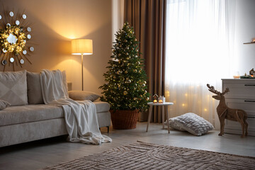 Poster - Beautiful Christmas tree and other decor in cozy room. Festive interior design