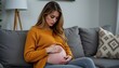 © Angelo - Pregnant woman reflecting at home lifestyle image cozy indoor environment intimate perspective