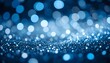 © Asad - Abstract Glitter Lights Background in Silver and Blue with De-focused Sparkle Effect