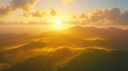 Wall Mural - Golden sunlight bathes the mountains and clouds at sunrise. Use this to represent peace, growth, or new beginnings.