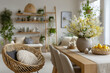 © vasyl pshyk - Celebrate spring with a beautifully arranged Easter table featuring vibrant eggs, fresh lemons, and delightful flowers in a cozy modern interior