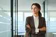 © insta_photos - Happy middle aged businesswoman manager, mature professional executive, corporate leader wearing suit looking away thinking of success. Confident 45 years old woman business owner standing in office.