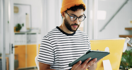 Aufkleber - Creative, man and reading on tablet in office for research, schedule update and review newsletter. Male journalist, digital and editing article, story information and feedback of magazine publication