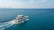© DND - White Boat Sailing on Blue Ocean