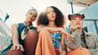 © peopleimages.com - Portrait, below and women in city, fashion and diversity with urban town, stylish clothes and gen z. Low angle, friends and people in street, outdoor and female empowerment with confidence and pride
