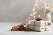 © Dejan - cozy christmas scene featuring collection of aromatic spices like cinnamon sticks star anise and cloves arranged