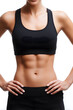 © Oksana_Latysheva - Woman's Midsection in Black Sportswear  Isolated On White Background. Woman in Sportswear Showing Abdominal Muscles