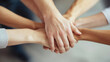 © nattapon98 - Team members shaking hands in unity after successful collaboration, showcasing teamwork and trust