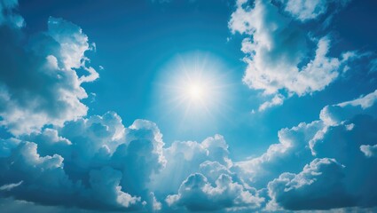 Wall Mural - blue sky scene with clouds and a luminous sun flare background