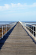 © Austockphoto - looking along jetty - high angle vertical