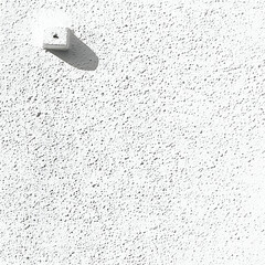 Wall Mural - White wall texture with small square object casting shadow.  Architectural background image for design