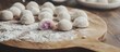 © yasna  - Delicious homemade mochi balls with sweet purple filling on wooden board