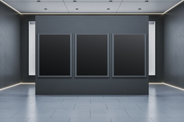 Fototapete - Dark modern gallery interior with three blank vertical poster frames on central wall for design mockup or branding presentation template. 3D Rendering
