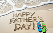 © Mojaher - Happy fathers day beach sand message flip flops