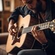 © Muhammad Aamir - Man Playing Acoustic Guitar Indoors , Close-Up of Hands and Strings