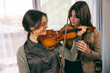 © milanmarkovic78 - Student Teaching How To Play Violin