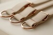 © Agent Neptunus - Closeup view of three light beige leather dog collars.