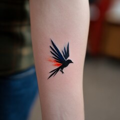 Poster - Abstract Bird Tattoo on Arm with Ink Splash, Minimalist Black and Blue Bird Design