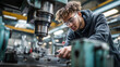© Frank Gärtner - Concentrated young apprentice wearing safety glasses operating milling machine in factory during vocational training