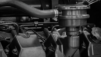Aufkleber - A car engine with a black hose and a black radiator cap