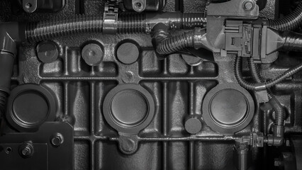 Aufkleber - The engine - a close-up of its internal workings, showing the intricate details of its design. The black color of the engine adds a sense of depth and complexity.