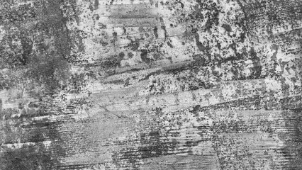 Aufkleber - A grey and black background with a few white lines. The background is rough and has a lot of texture