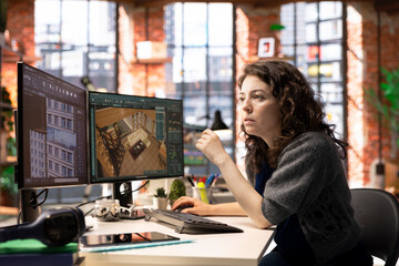 worker in a creative office uses cad software to design a house interior, provides a user interface 