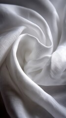 Fototapete - Abstract close-up of flowing white linen fabric creating soft curves and shadows in a studio setting for a minimalist aesthetic
