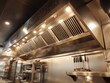 © Ketobox - Stainless steel commercial kitchen exhaust hood system low angle view restaurant equipment ventilation system cooking appliance interior