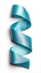 Wall Mural - turquoise ribbon unfurling on white background overhead shot celebration gift wrapping decoration cr