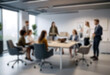 © Adi - having a meeting in a blurry office, the atmosphere of a group of people having a meeting in a natural-themed, modern office with a wooden table, with a blurry office background