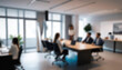 © Adi - having a meeting in a blurry office, the atmosphere of a group of people having a meeting in a natural-themed, modern office with a wooden table, with a blurry office background