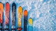 © manuk - Colorful skis aligned on snowy surface showcasing winter sports equipment