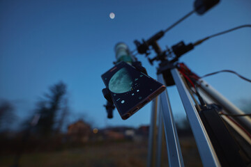 Wall Mural - astronomy telescope coupled with a smartphone for capturing moon, stars, planets and other celestial
