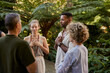 © Rido - People meditating at holistic retreat with hands on heart